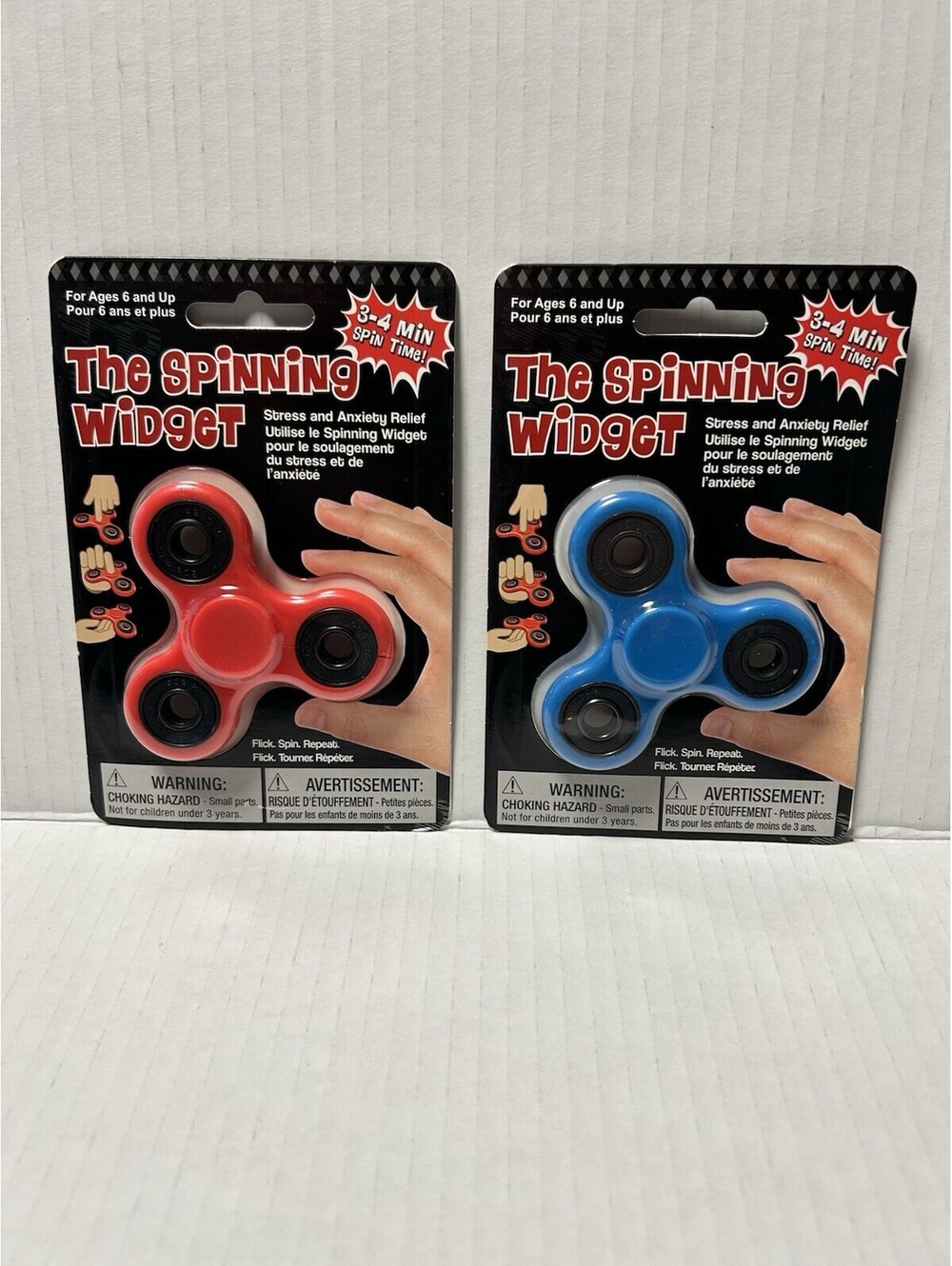 The Spinning Widget Bundle of 2 Fidget Spinners Red & Blue - Stress Relief
